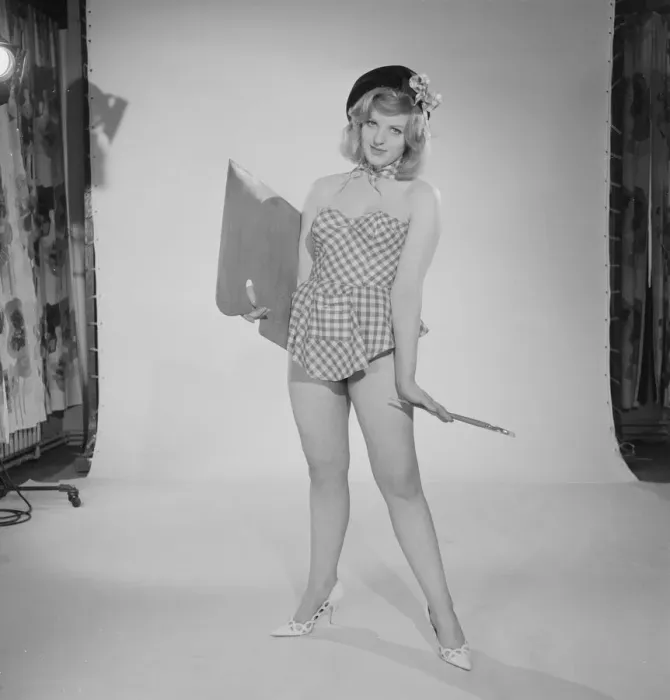 Framed Print : Reveille art Feature. Model Peggy Cage seen here wearing a check short summer dress Framed Print : Reveille art Feature. Model Peggy Cage seen here wearing a check short summer dress