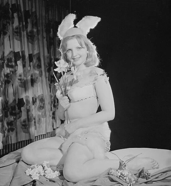 Reveille Easter Bunny Feature. Model Peggy Cage nseen here wearing a fur trim bathing