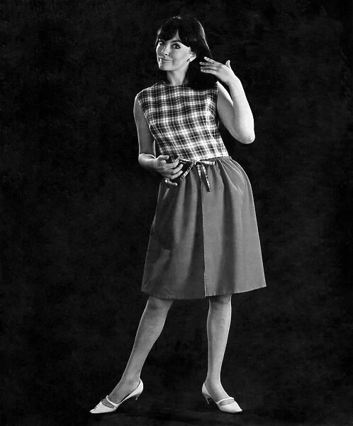 Reveille Fashion 1965. Mannequin wearing Ginham blouse and skirt August 1965 P006841