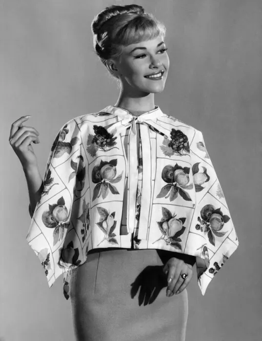 Framed Print : Reveille fashions 1961: Jo Waring wearing a floral print blouse. December 1961 P008817