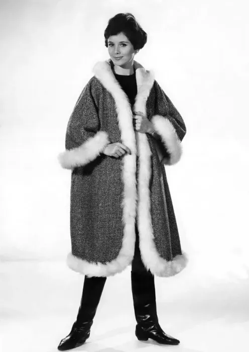 Framed Print : Reveille Fashions 1963: Ann Cave wearing a fur trimmed winters coat