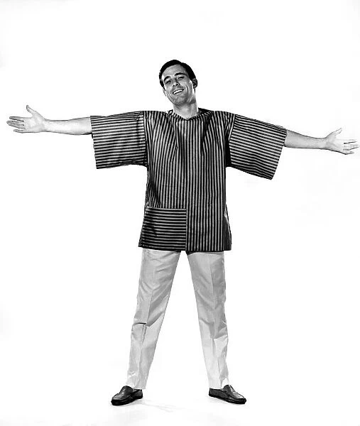 Reveille Fashions 1963: Peter Anthony models a loose fitting striped beach shirt