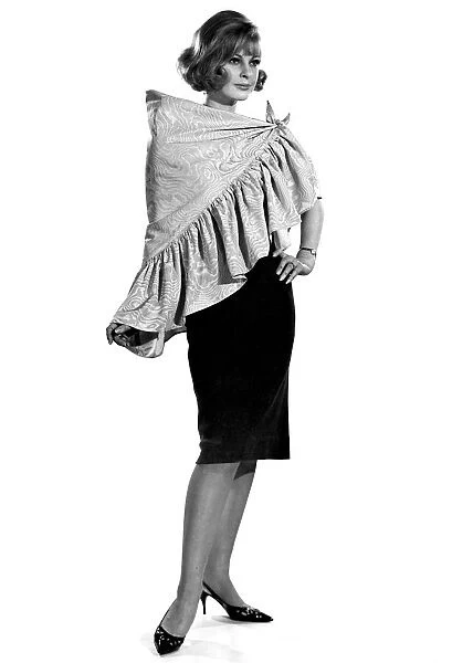 Reveille Fashions 1964: Dawn Chapman seen here modeling the latest in cape design