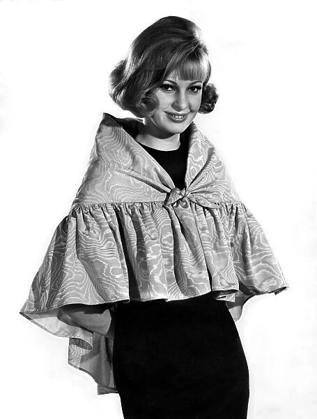 Reveille Fashions 1964: Dawn Chapman seen here modeling the latest in cape design