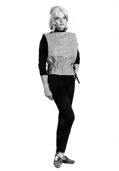 Framed Print : Reveille Fashions 1964: Dianna Terry modeling a bib top with black slacks Framed Print : Reveille Fashions 1964: Dianna Terry modeling a bib top with black slacks
