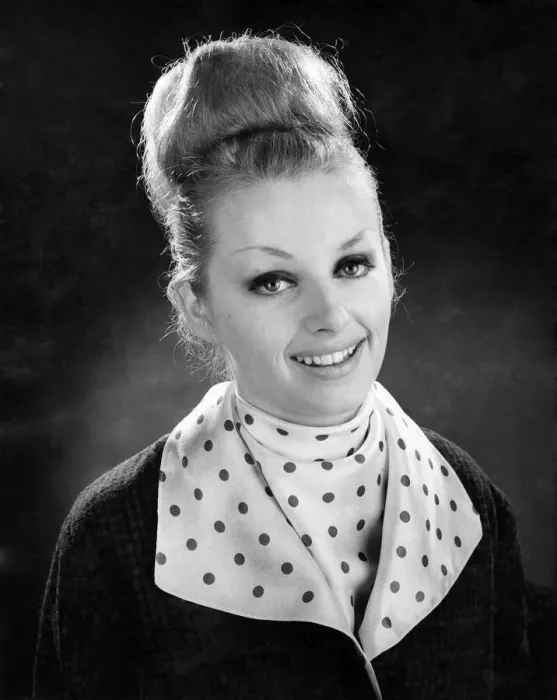 Framed Print : Reveille Fashions 1964. Model wearing coat with polka dot collar with matching top