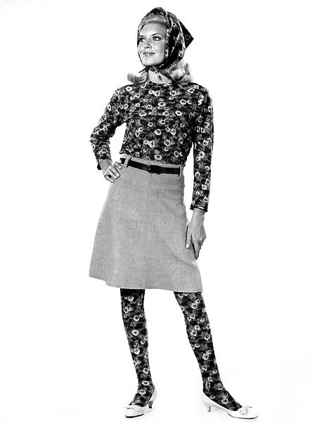 Reveille fashions 1965: Maureen Walker wearing floral pattern bodysuit under a skirt with