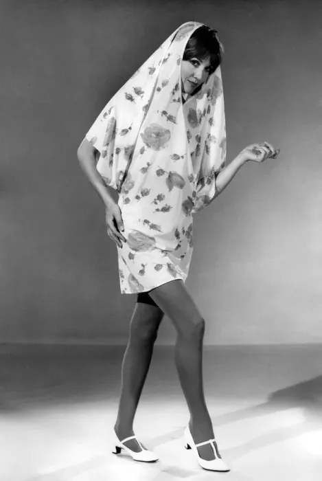 Framed Print : Reveille Fashions 1966: Anne Powell modelling summer dress come shower coat