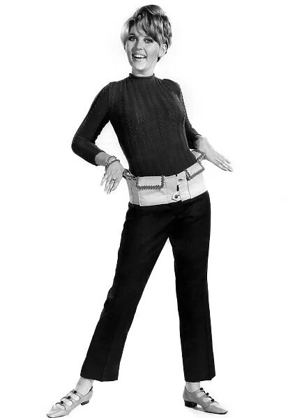 Reveille Fashions 1966: Delia Freeman modelling trouser suit. November 1966 P006594