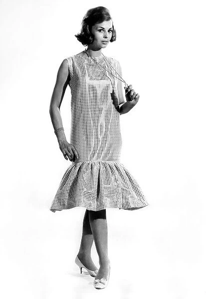 Reveille fashions: Angela Smith seen here modelling full length dress