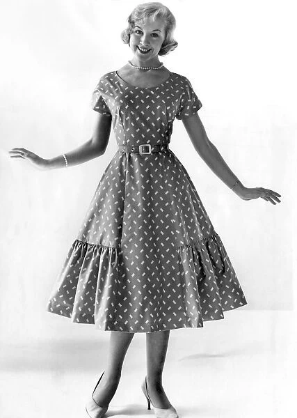 Reveille Fashions: Audrey Wayne. July 1958 P025269