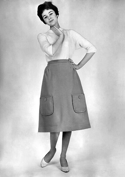 Reveille fashions: Jackie Jackson modelling a pocketed skirt. September 1960 P008989
