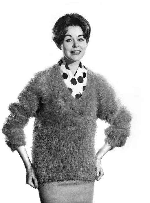 Framed Print : Reveille Fashions: Jackie Jackson wearing a angora jumper with polka dot scarf Framed Print : Reveille Fashions: Jackie Jackson wearing a angora jumper with polka dot scarf
