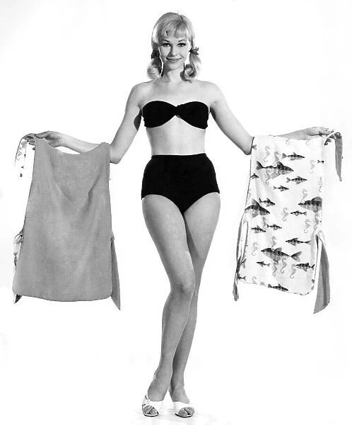 Reveille Fashions: Jo Waning modeling a bikini. July 1963 P007622