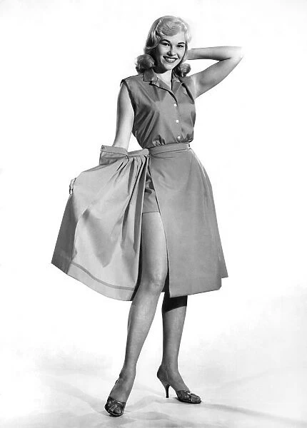 Reveille fashions: Jo Waring modelling a beach dress with detachable skirt