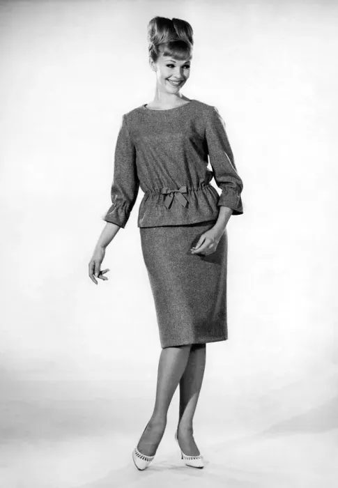 Framed Print : Reveille Fashions: Jo Waring wearing matching twin set. November 1964 P006839