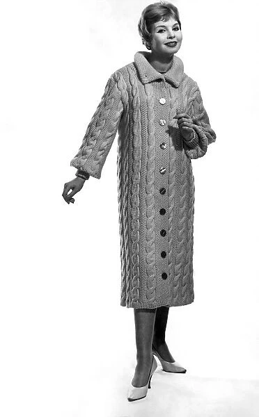 Reveille Fashions: Long Cable. April 1958 P025275