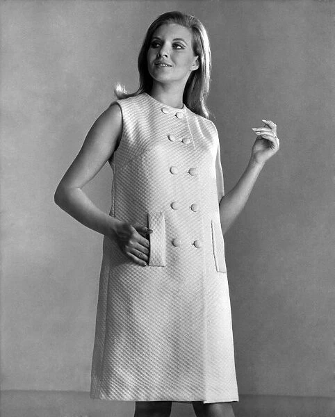 Reveille Fashions. Mannequin modelling a summer dress July 1967 P006710