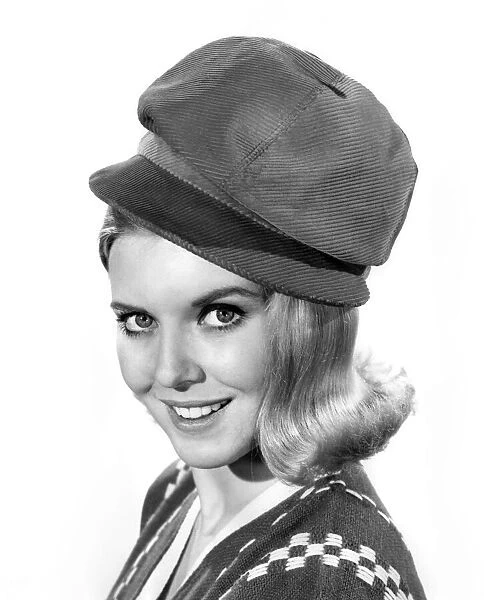 Reveille Fashions: Maureen Walker. modeling a corduroy hat August 1964 P007600