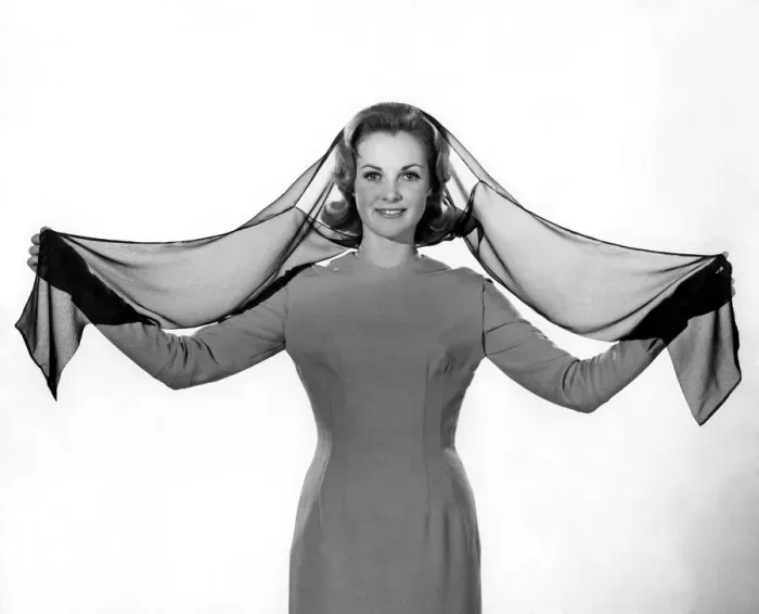 Framed Print : Reveille Fashions: Roma Reeves modeling a head scarf. February 1961 P006876 Framed Print : Reveille Fashions: Roma Reeves modeling a head scarf. February 1961 P006876