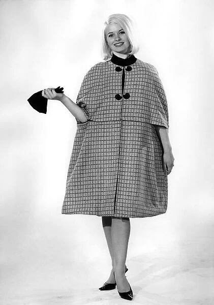 Reveille Fashions: Vyvyyan Dunber. October 1964 P06764. Coat & Gloves