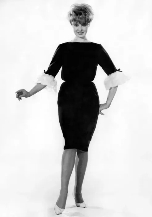 Framed Print : Reveille Fashions: Yvette Danis one-piece blouse - petticoat. September 1961 P008789