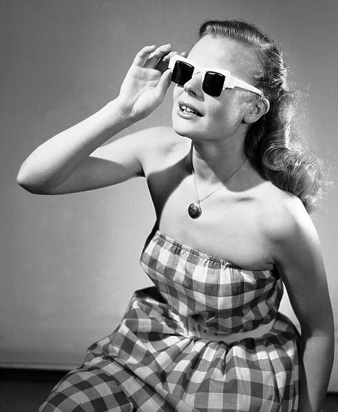 Reveille mannequin seen here modelling the latest summer fashions for 1956