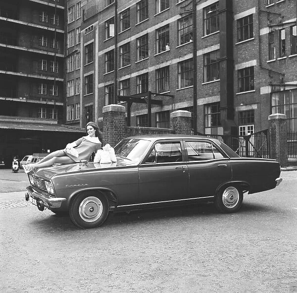 Reveille model Beulah Hughes seen here posing with a Vauxhall Cresta which is top prize