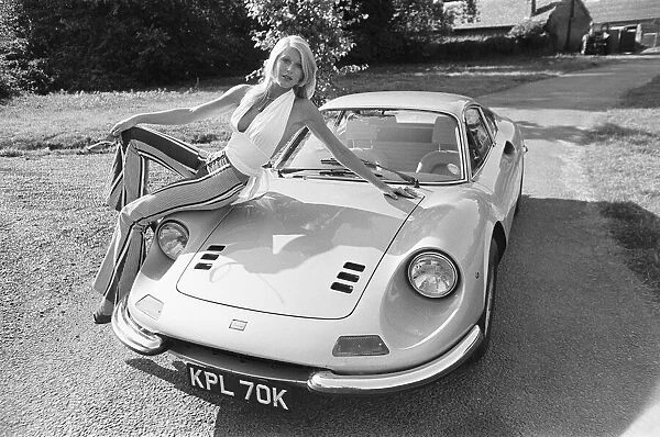 Reveille model Heidi seen here posing with a Ferrari Dino GT which is NOT A top prize in