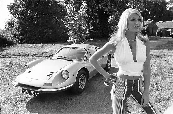 Reveille model Heidi seen here posing with a Ferrari Dino GT which is NOT A top prize in