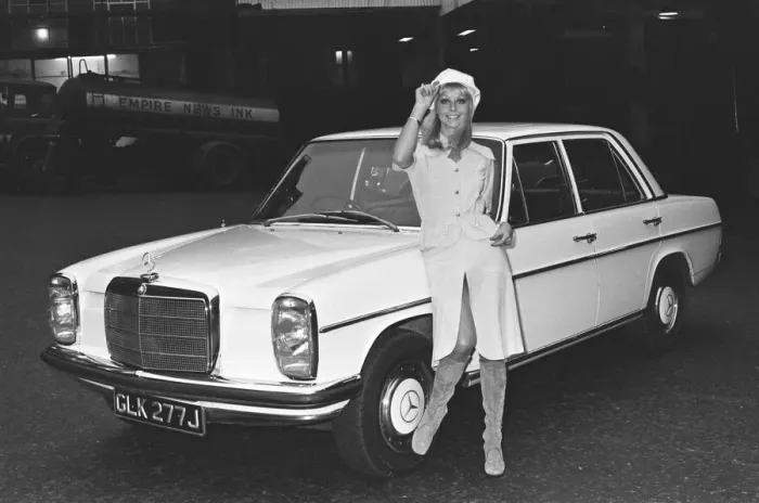 Framed Print : Reveille model seen here posing with a Mercedes Benz car which is top prize in Framed Print : Reveille model seen here posing with a Mercedes Benz car which is top prize in