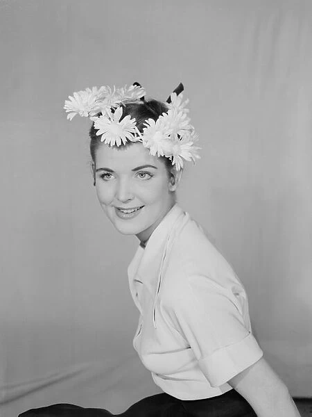 Reveille model seen here wearing a flower circle in her hair