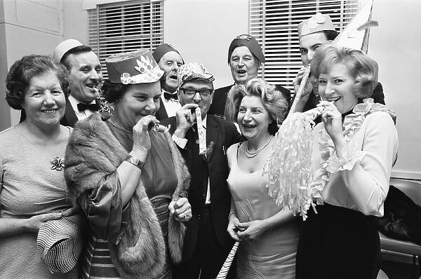 Revellers attending a New Years Eve Ball in West Bromwich. 31st December 1970