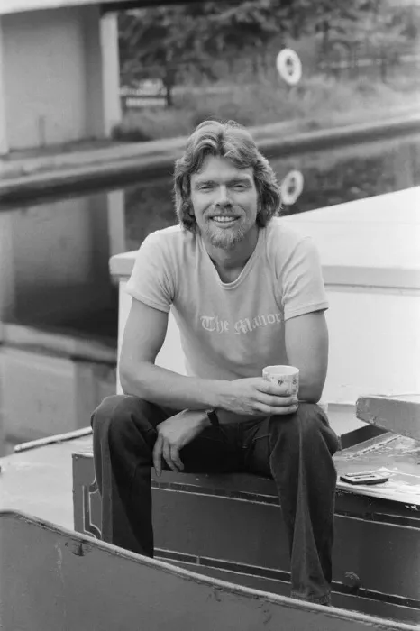 Framed Print : Richard Branson, 28 year old mastermind behind Virgin Music company. Relaxing on his boat