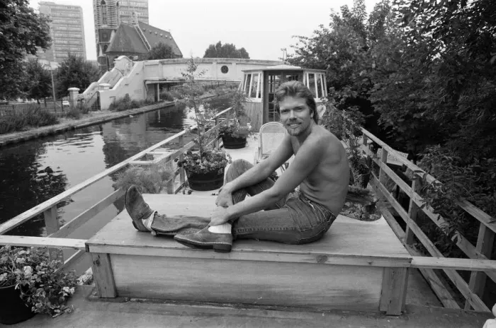 Framed Print : Richard Branson aboard his houseboat  /  office at Maida Vale, London. 31st July 1982