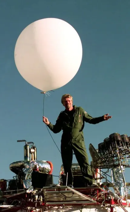 Framed Print : Richard Branson on top of his Balloon capsule December 1997 with a small weather test Framed Print : Richard Branson on top of his Balloon capsule December 1997 with a small weather test