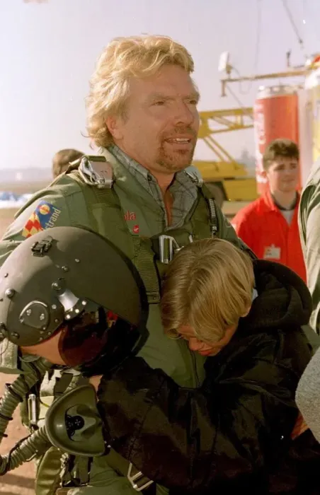 Framed Print : Richard Branson about to board the Virgin Global Challenger balloon is hugged by son Sam