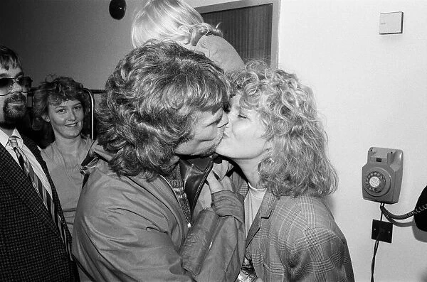 Richard Branson pictured kissing with his girlfriend Joan Templeman as they are re-united