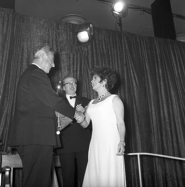 Richard Burton and Elizabeth Taylor seen here at film awards where Mrs