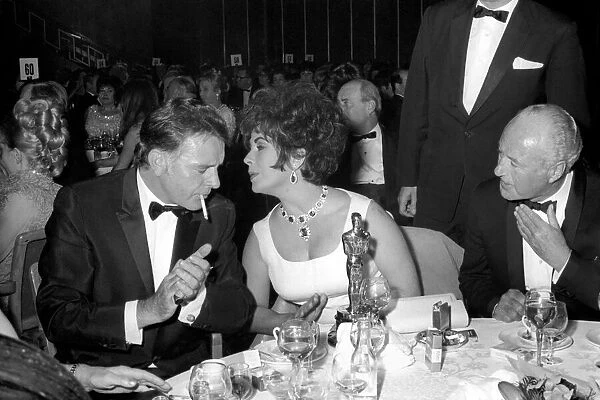 Richard Burton and Elizabeth Taylor seen here receiving best actor