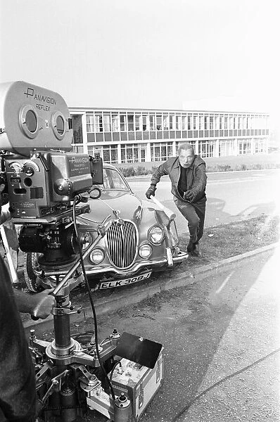 Richard Burton during location filming of 'The Villain'