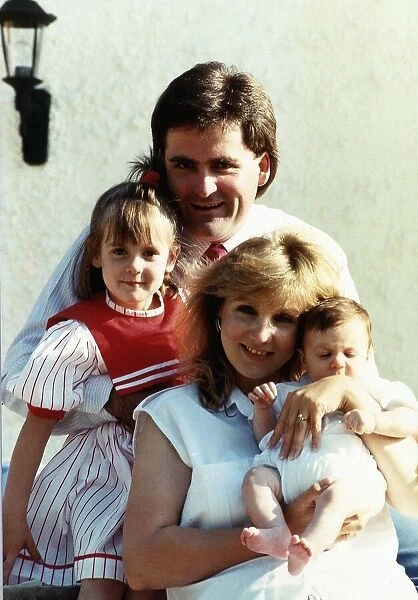 Richard Keays TV Presenter with his family at home in Datchett Berks