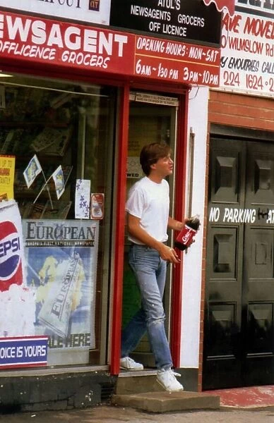 Richard Madeley TV Presenter leaving a local newsagent with a bottole of coke