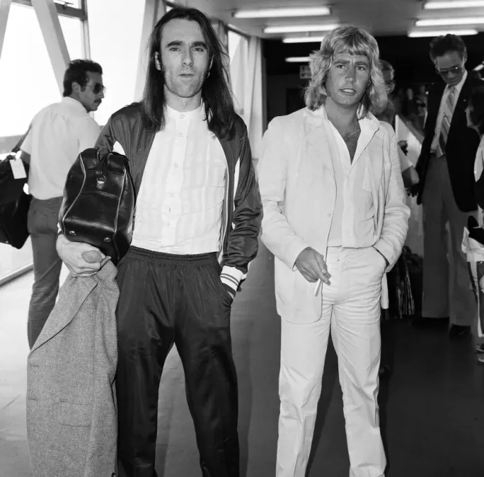 Framed Print : Rick Parfitt (right) and Francis Rossi (left) of the Status Quo pop group arriving