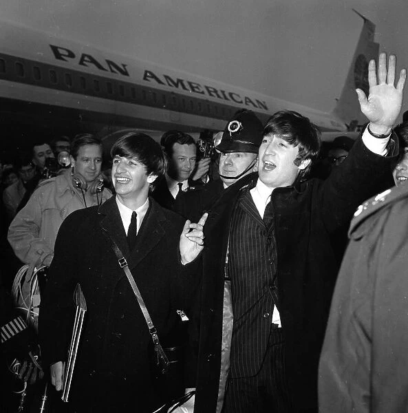 Ringo Starr and John Lennon of The Beatles arriving in the UK before The Daily Mirror