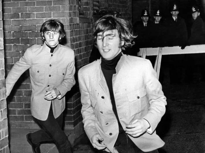 Framed Print : Ringo Starr and John Lennon dash from the fans in Birmingham in 1963