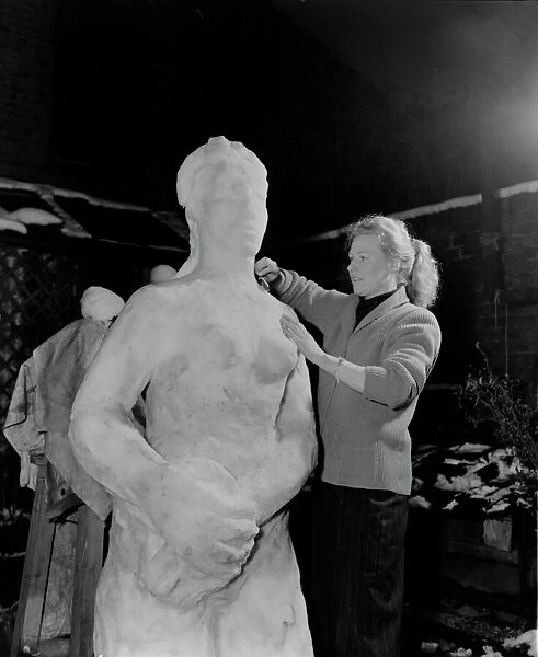 Rita Ling Sculptress Carves snowman 31  /  3  /  1952 C1621  /  1