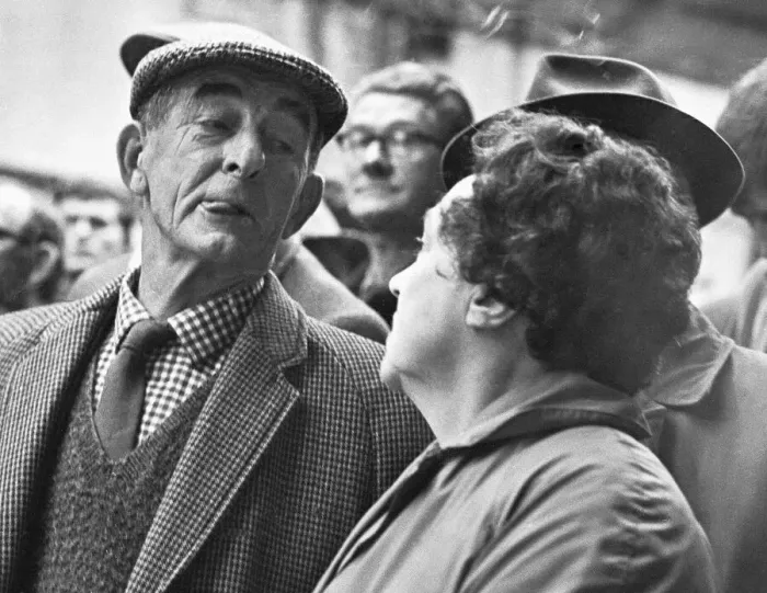 Framed Print : Rival bidders giving knowing looks to each other during the Christmas Turkey Auction