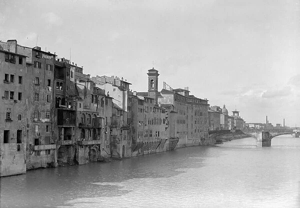 The River Arno at Florence seen from the Ponte Vecchio. Circa 1925