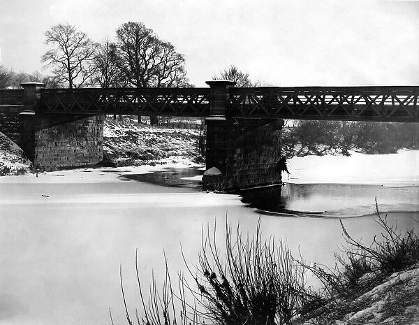 The River Wear is frozen over from bank to bank near Lambton Castle